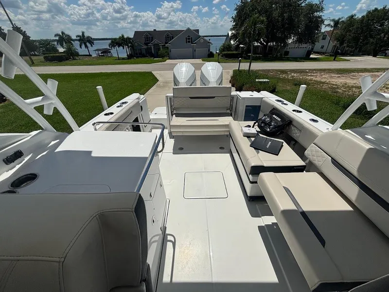 Slide: The Image of Interior of a 2021 Blackfin 272 DC boat with seating area. - 10