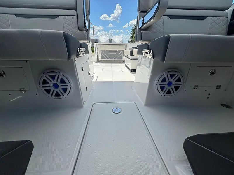 Slide: The Image of Interior of a 2021 Blackfin 272 DC boat with speakers. - 14