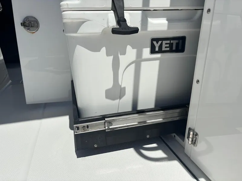 Slide: The Image of YETI cooler in Blackfin 272 DC boat, 2021 model. - 18