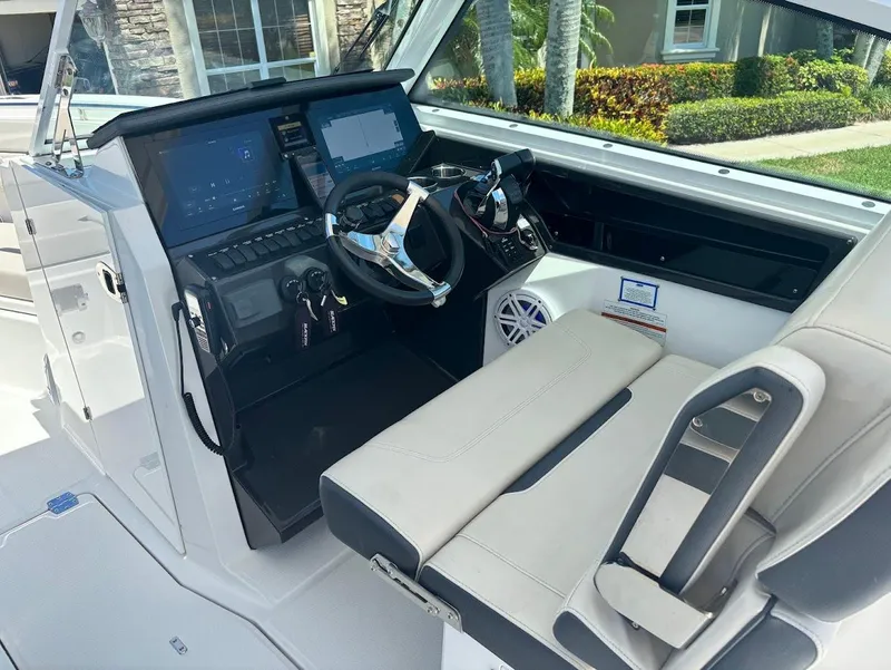 Slide: The Image of Interior view of 2021 Blackfin 272 DC boat cockpit. - 8