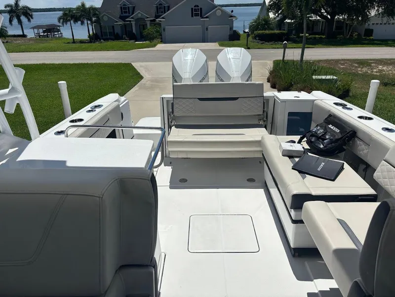 Slide: The Image of Interior view of a 2021 Blackfin 272 DC boat with seating area. - 9