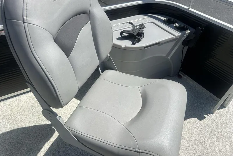 Slide: The Image of Gray seating area on a 2021 Bennington 20 SFX boat with storage and cup holders. - 11