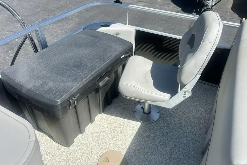 Slide: The Image of 2021 Bennington 20 SFX boat interior with seating and storage box. - 12