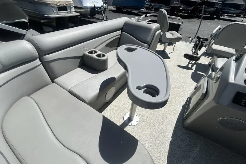 Slide: The Image of Interior of a 2021 Bennington 20 SFX pontoon boat with seating and table. - 19