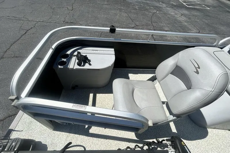 Slide: The Image of 2021 Bennington 20 SFX boat interior with gray seating and cup holders. - 4