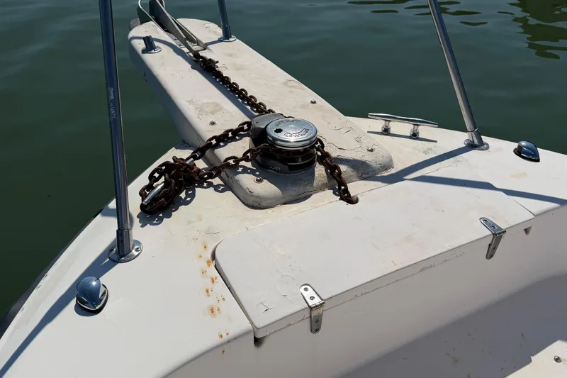 Slide: The Image of Bow of 1996 Grady-White Marlin 300 with anchor chain and winch. - 15