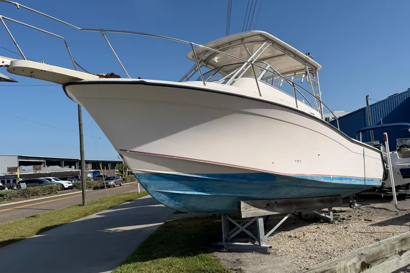 Slide: The Image of 1996 Grady-White Marlin 300 boat on display, showcasing sleek design and sturdy construction. - 4