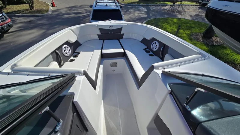 Slide: The Image of 2023 Monterey M225 boat interior with spacious seating and modern design. - 11