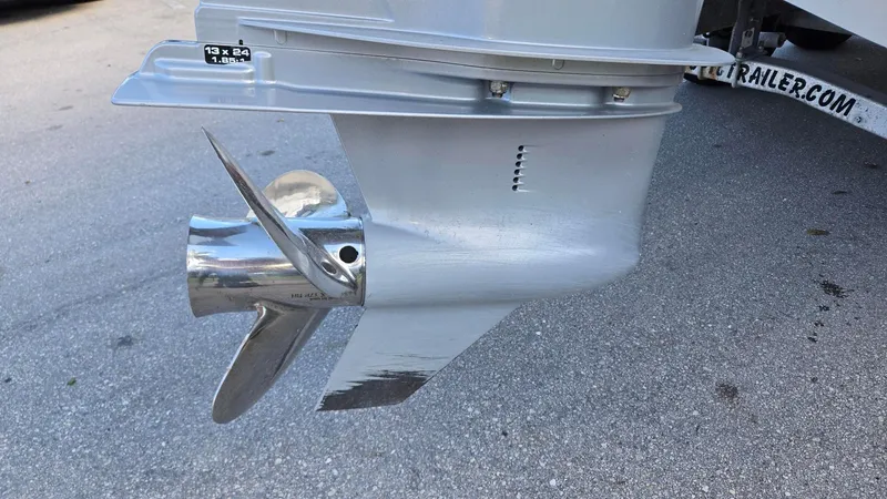 Slide: The Image of 2023 Monterey M225 boat propeller on a trailer, showcasing sleek design and metallic finish. - 2