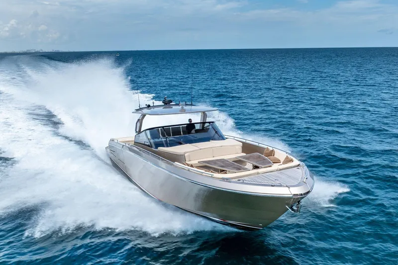 Slide: The Image of 2019 CNM Continental 54 yacht cruising on open ocean waters. - 1