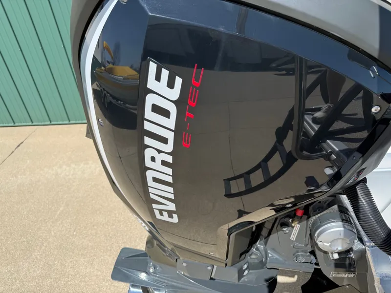 Slide: The Image of Evinrude E-TEC outboard motor on a 2018 Bennington 25 SX boat. - 11