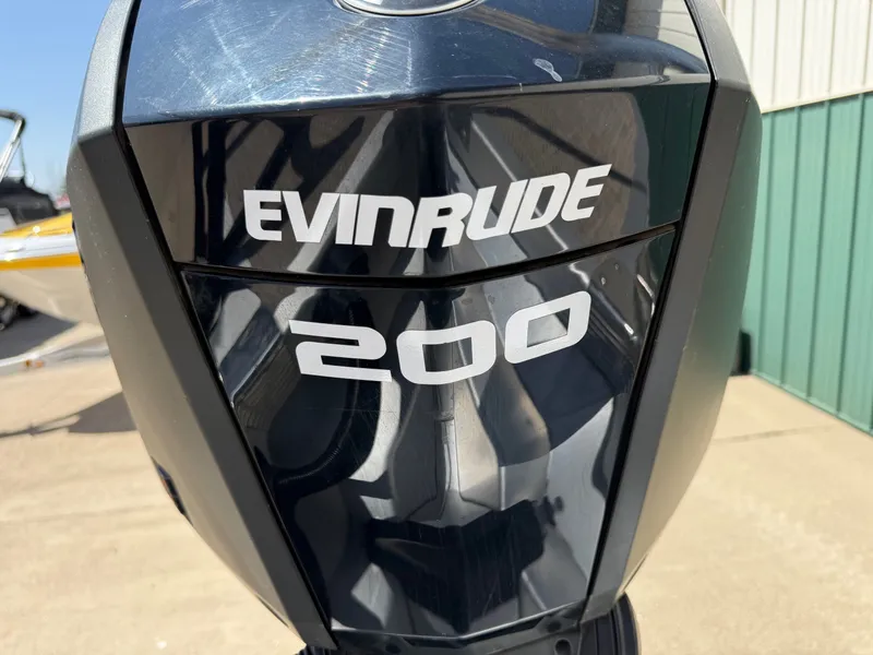Slide: The Image of Evinrude 200 outboard motor on a 2018 Bennington 25 SX boat. - 12