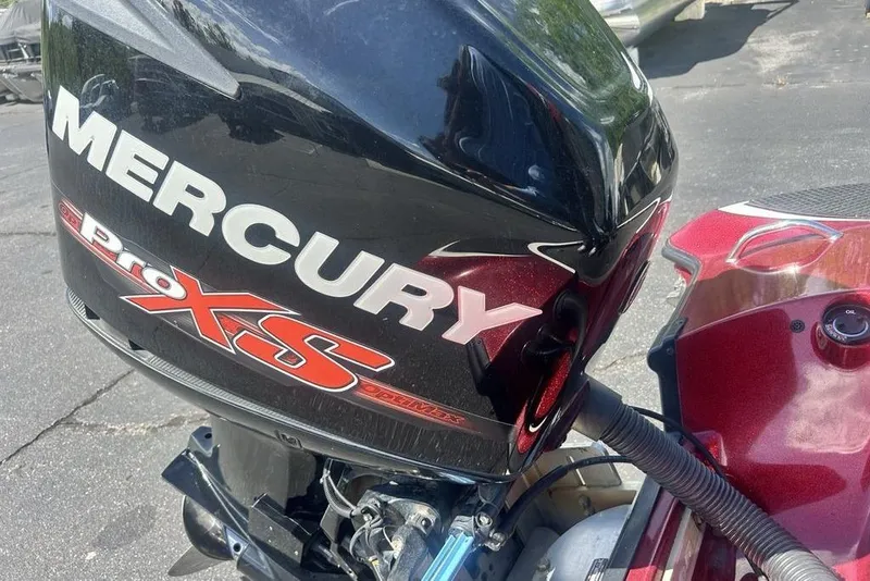 Slide: The Image of 2014 Triton 19XS boat with Mercury Pro XS outboard motor. - 18