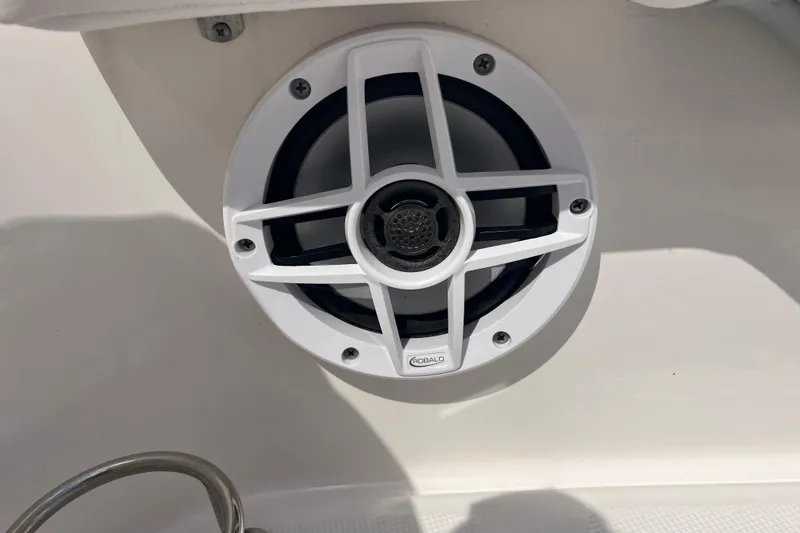 Slide: The Image of Speaker on 2022 Robalo R227 Dual Console boat, featuring a white grille design. - 44