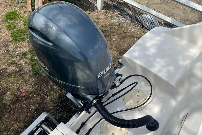 Slide: The Image of 2022 Robalo R227 Dual Console with Yamaha 200 outboard engine. - 49