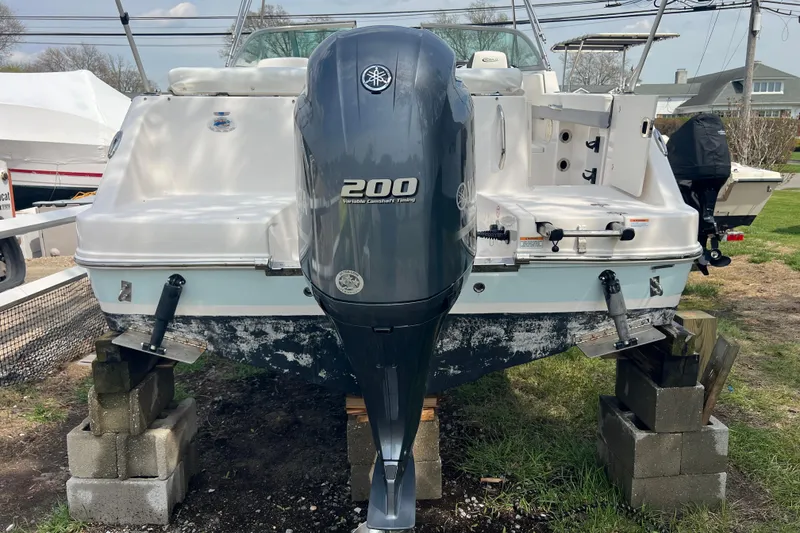 Slide: The Image of 2022 Robalo R227 Dual Console boat with Yamaha 200 engine on blocks. - 50
