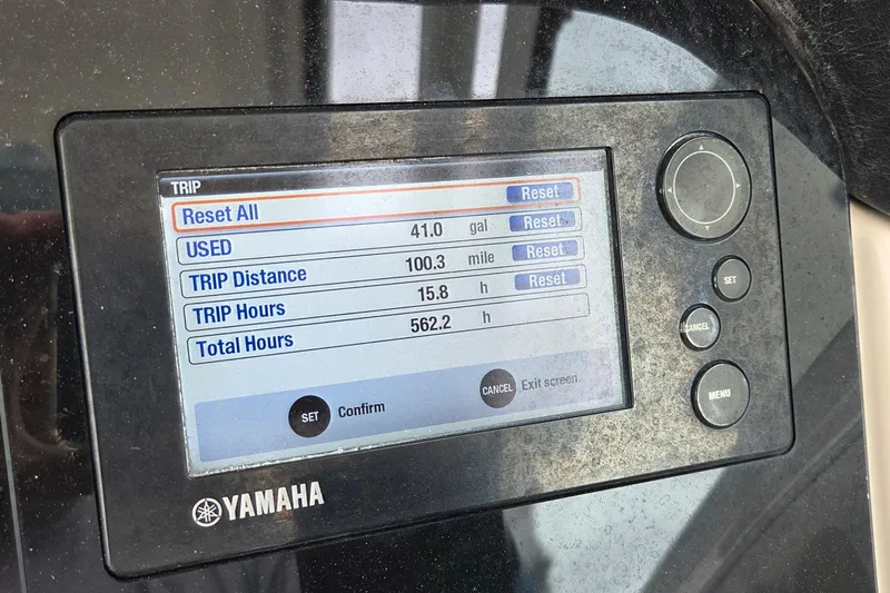 Slide: The Image of Yamaha display showing trip data on a 2017 Robalo R247 Dual Console boat. - 15