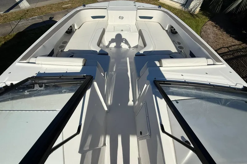 Slide: The Image of 2025 Hurricane SunDeck 235 OB boat interior with spacious seating and modern design. - 6