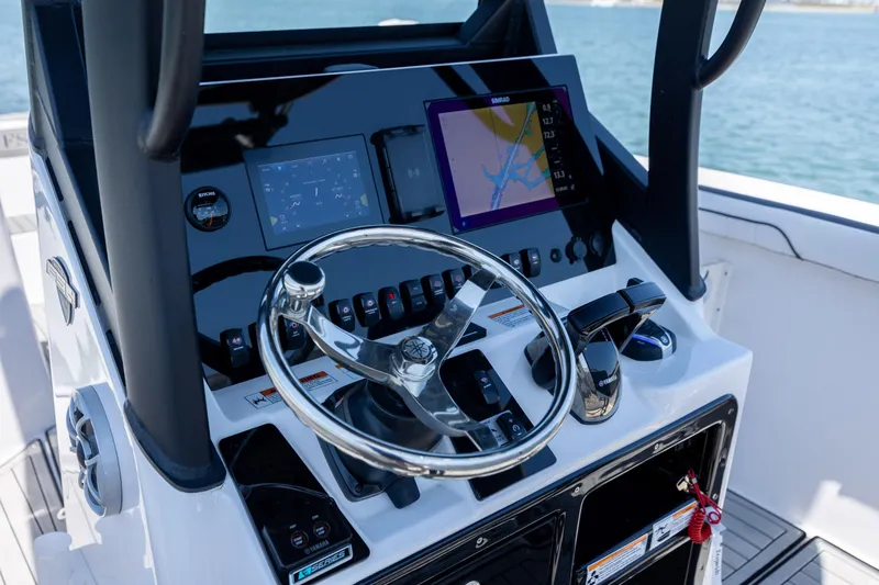 Slide: The Image of Control panel of 2025 Yamaha Boats 255 FSH Sport H with navigation display. - 19