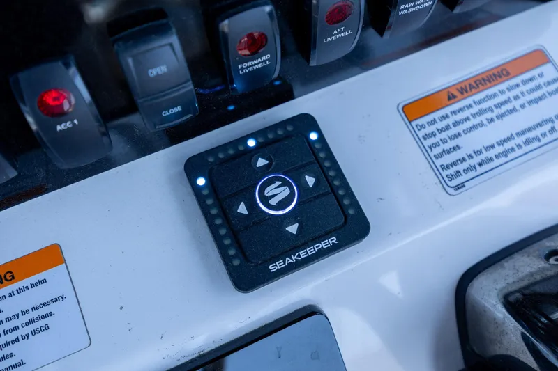 Slide: The Image of Control panel of 2025 Yamaha Boats 255 FSH Sport H with Seakeeper system. - 21