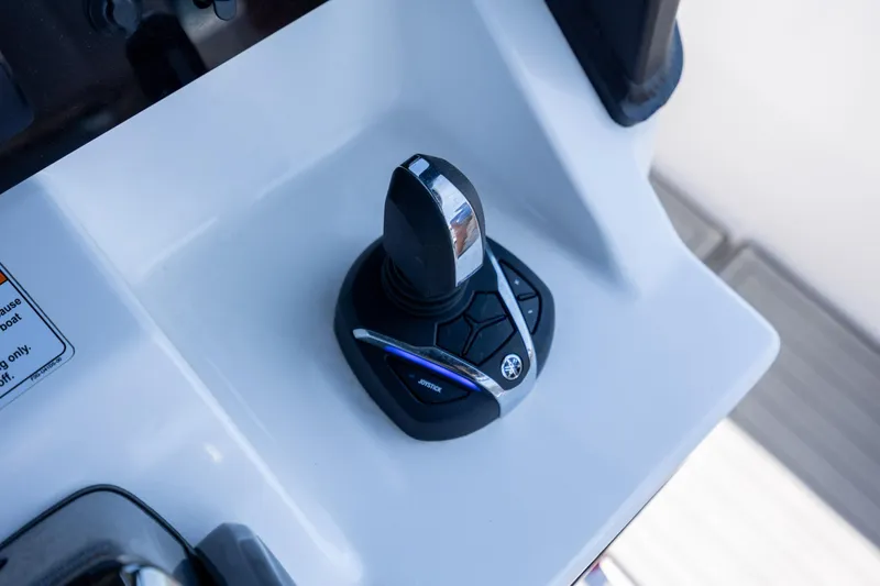 Slide: The Image of Joystick control on 2025 Yamaha Boats 255 FSH Sport H dashboard. - 22