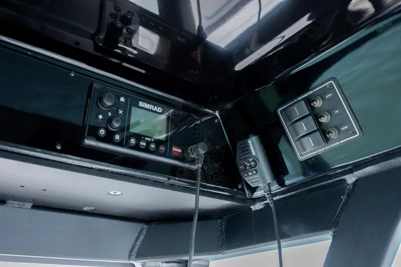 Slide: The Image of Control panel of 2025 Yamaha Boats 255 FSH Sport H with Simrad electronics. - 23