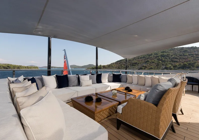 Slide: The Image of Luxurious Alia Yachts 60M 2016 deck with elegant seating and scenic ocean view. - 19