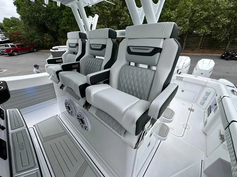 Slide: The Image of 2024 Blackfin 400 CC boat with luxurious seating and modern design. - 15