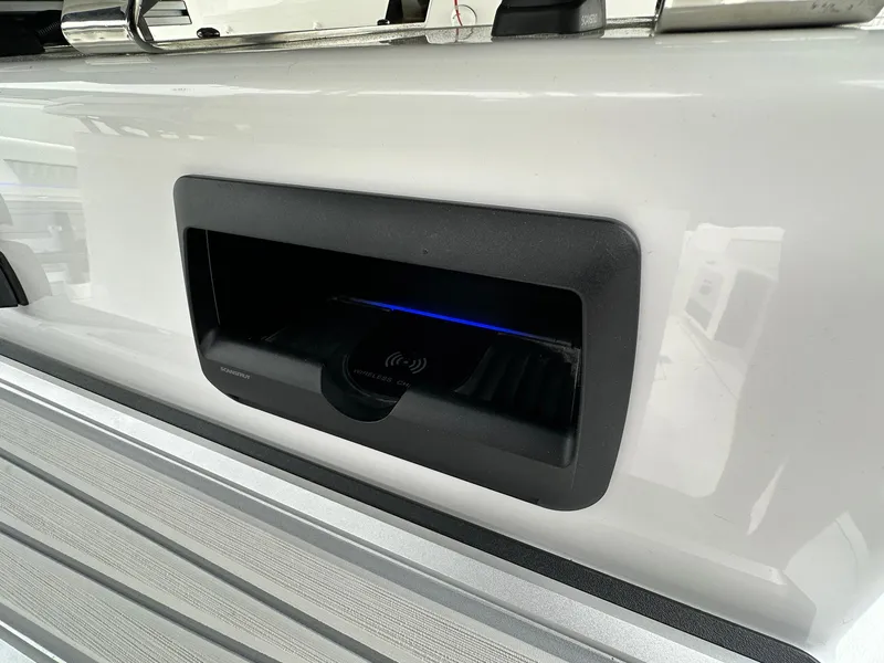 Slide: The Image of 2024 Blackfin 400 CC boat with built-in wireless charging station. - 17