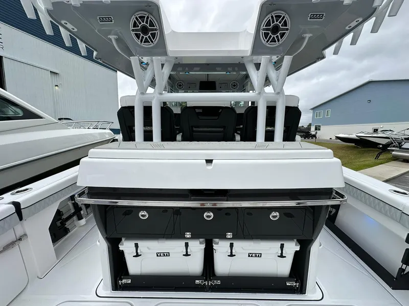 Slide: The Image of 2024 Blackfin 400 CC boat with Yeti coolers and advanced sound system. - 40