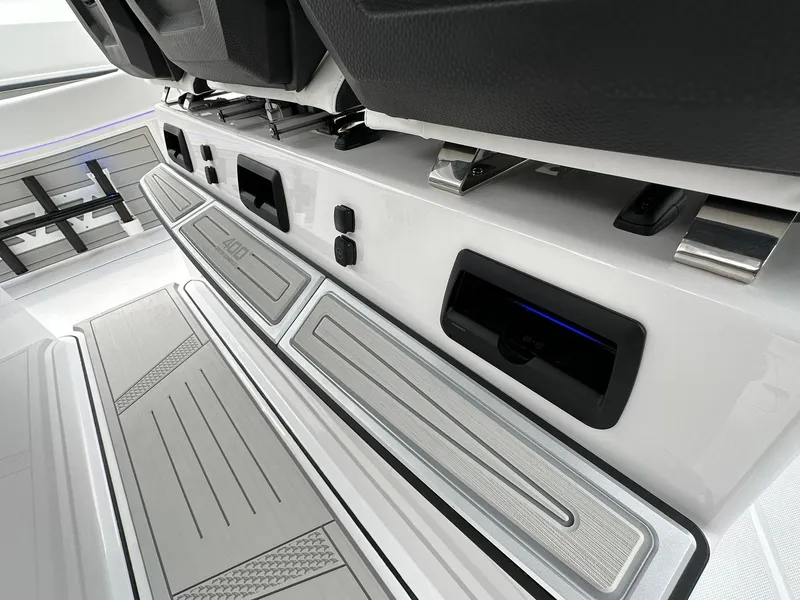 Slide: The Image of 2024 Blackfin 400 CC boat interior with modern seating and storage compartments. - 46
