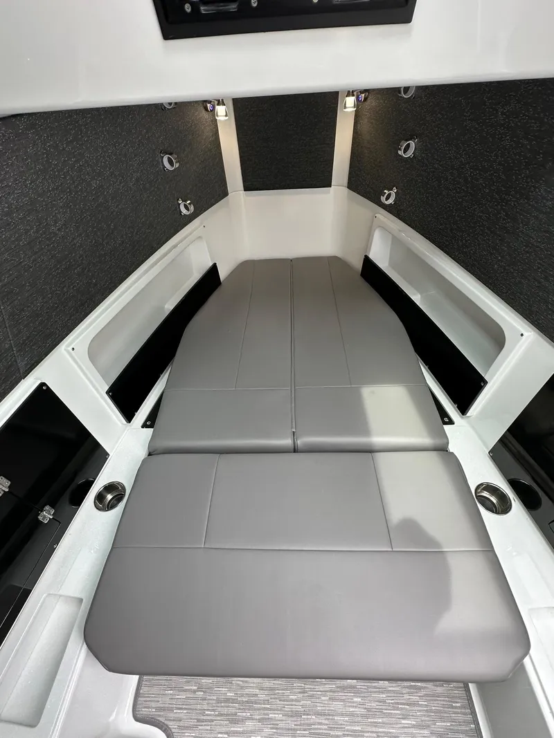 Slide: The Image of 2024 Blackfin 400 CC cabin interior with gray cushioned seating. - 51