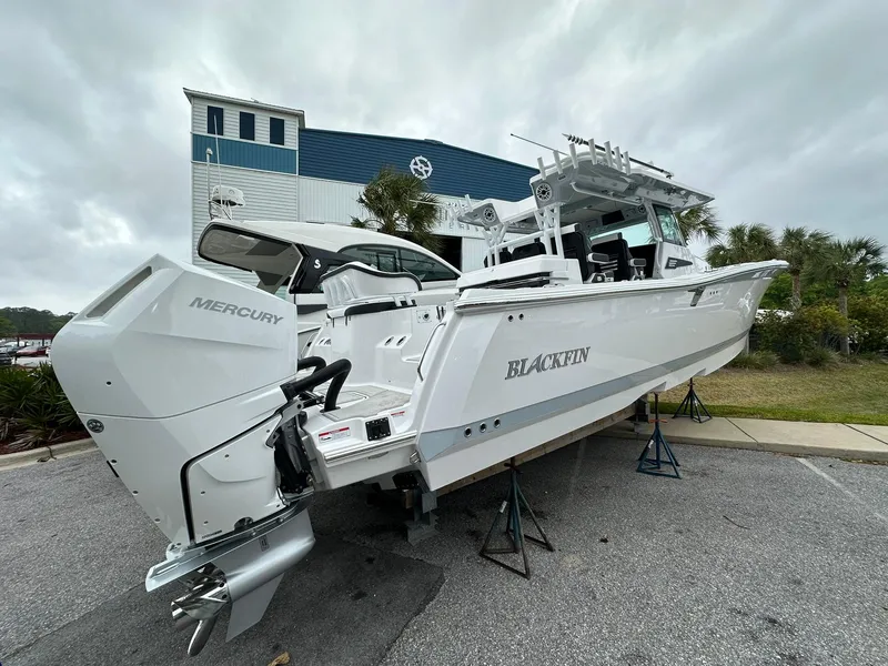 Slide: The Image of 2024 Blackfin 400 CC boat with Mercury engines on display. - 6