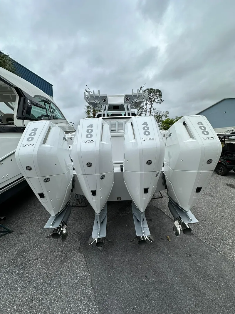 Slide: The Image of 2024 Blackfin 400 CC boat with quad 400 HP outboard engines. - 7