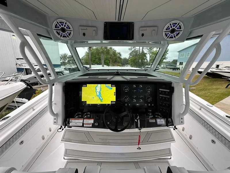 Slide: The Image of 2024 Blackfin 400 CC boat cockpit with advanced navigation system and controls. - 9