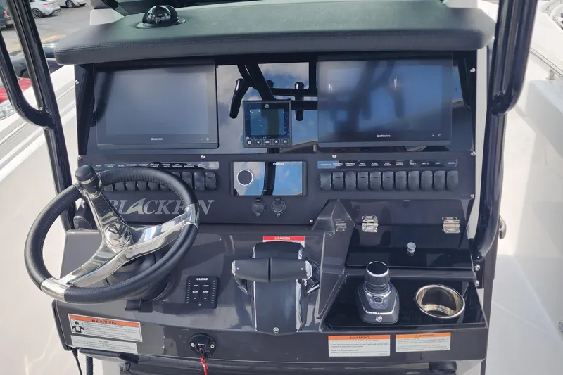 Slide: The Image of 2026 Blackfin 272 CC boat dashboard with advanced navigation and control systems. - 5