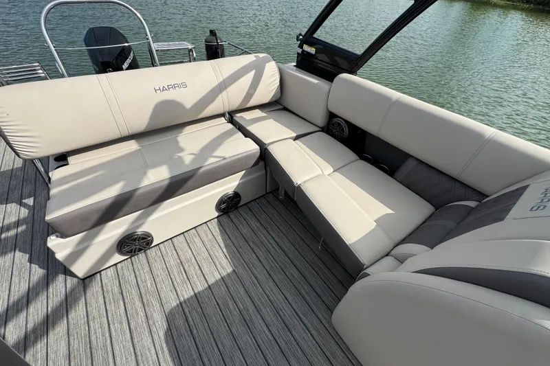 Slide: The Image of Luxurious seating on 2021 Harris Solstice 230 pontoon boat, featuring plush cushions and sleek design. - 20