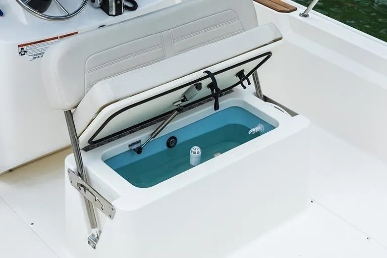 Slide: The Image of Manufacturer Provided Image: 2025 Boston Whaler 190 Montauk boat seat with built-in storage compartment open. - 11