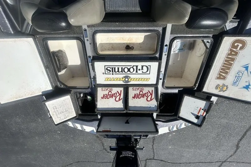 Slide: The Image of 2007 Ranger Z20 boat interior with storage compartments and branded labels. - 19