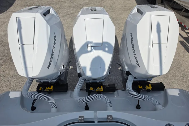 Slide: The Image of Triple Mercury outboard engines on a 2026 Yellowfin 36 Offshore boat. - 19