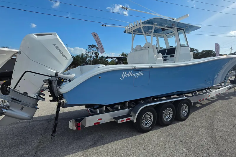 Slide: The Image of 2026 Yellowfin 36 Offshore boat on trailer, featuring Mercury outboard engine. - 3