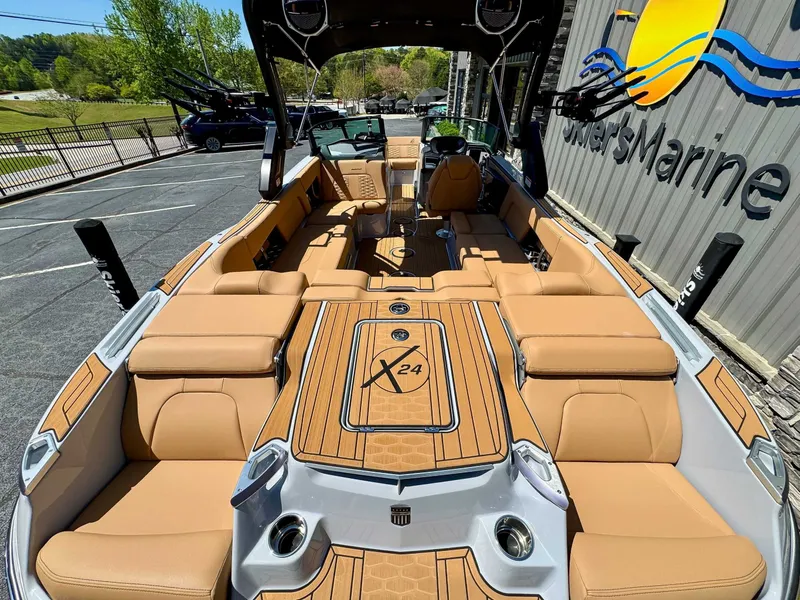 Slide: The Image of Interior view of 2024 MasterCraft X24 boat with luxurious features. - 10