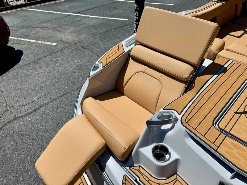 Slide: The Image of Luxurious seating area of the 2024 MasterCraft X24 boat. - 11