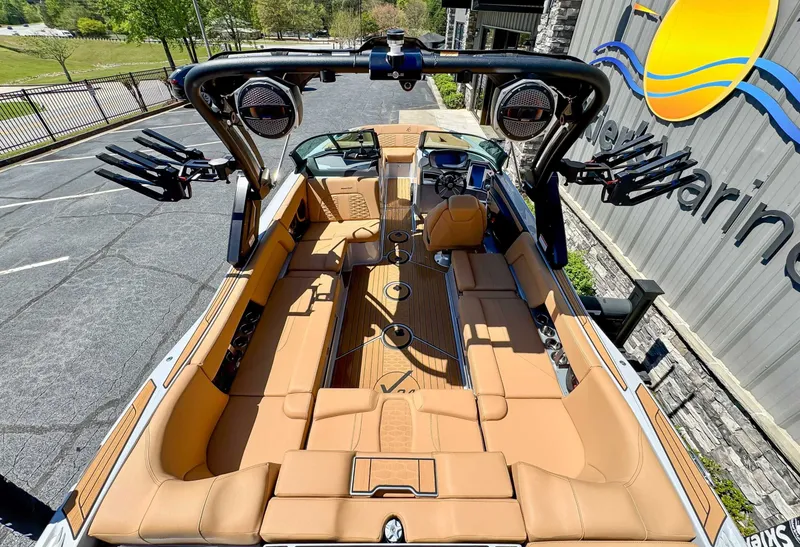 Slide: The Image of Interior view of 2024 MasterCraft X24 boat with luxurious features. - 12