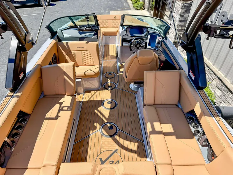 Slide: The Image of Interior of 2024 MasterCraft X24 boat with luxurious seating. - 13