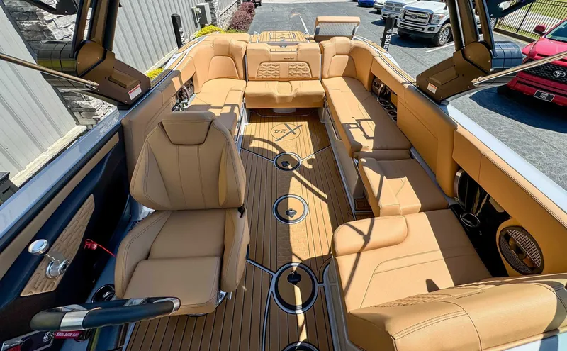 Slide: The Image of Interior of 2024 MasterCraft X24 boat with luxurious leather seating. - 15