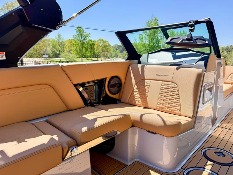 Slide: The Image of 2024 MasterCraft X24 interior with luxurious seating. - 16