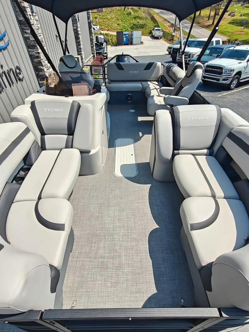 Slide: The Image of Interior of a 2023 Sylvan L-3 CLZ DH pontoon boat with luxurious seating. - 11