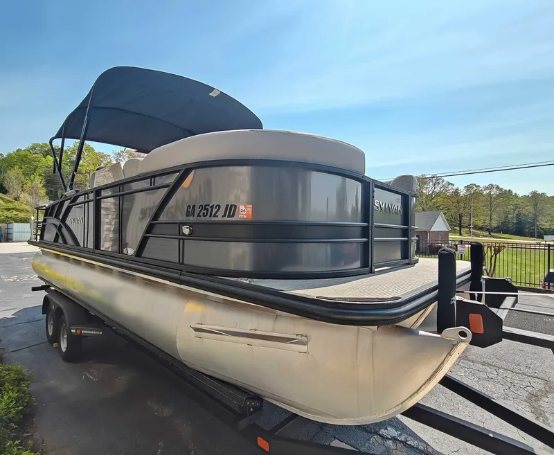 Slide: The Image of 2023 Sylvan L-3 CLZ DH pontoon boat on trailer. - 5