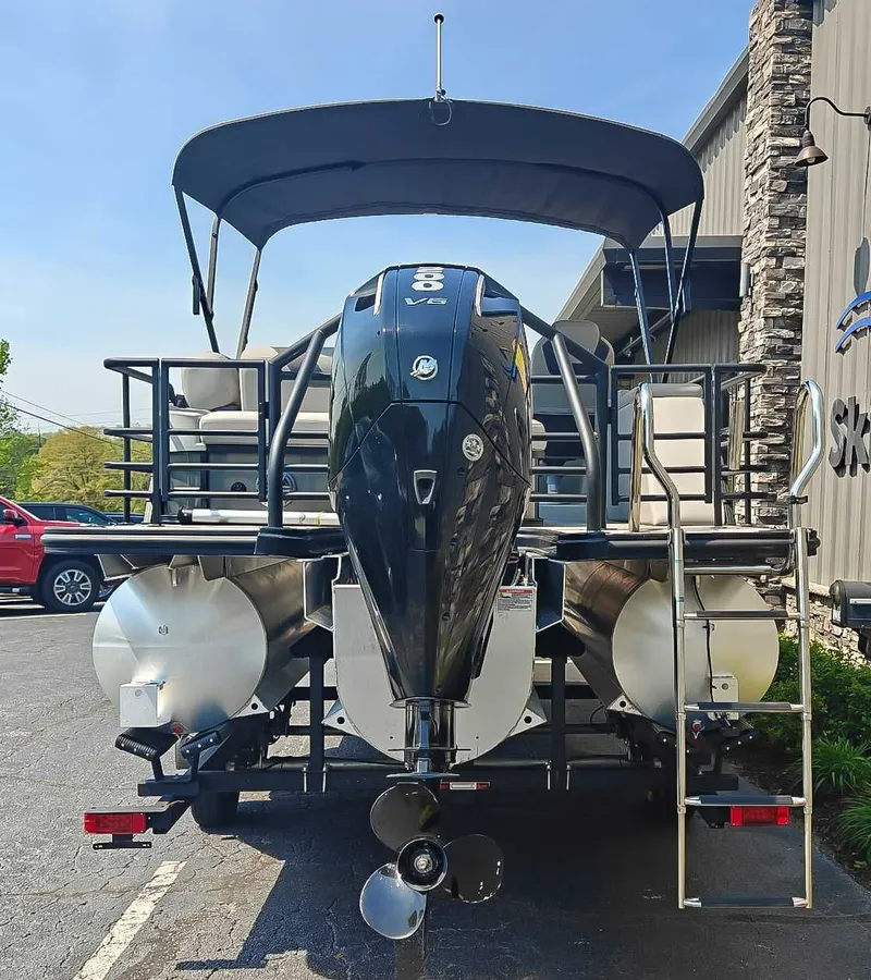 Slide: The Image of 2023 Sylvan L-3 CLZ DH pontoon boat with outboard motor. - 8